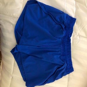 ivivva blue shorts with zipper pockets (size 14)